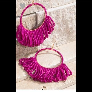Hot pink seadbead dangle earrings.